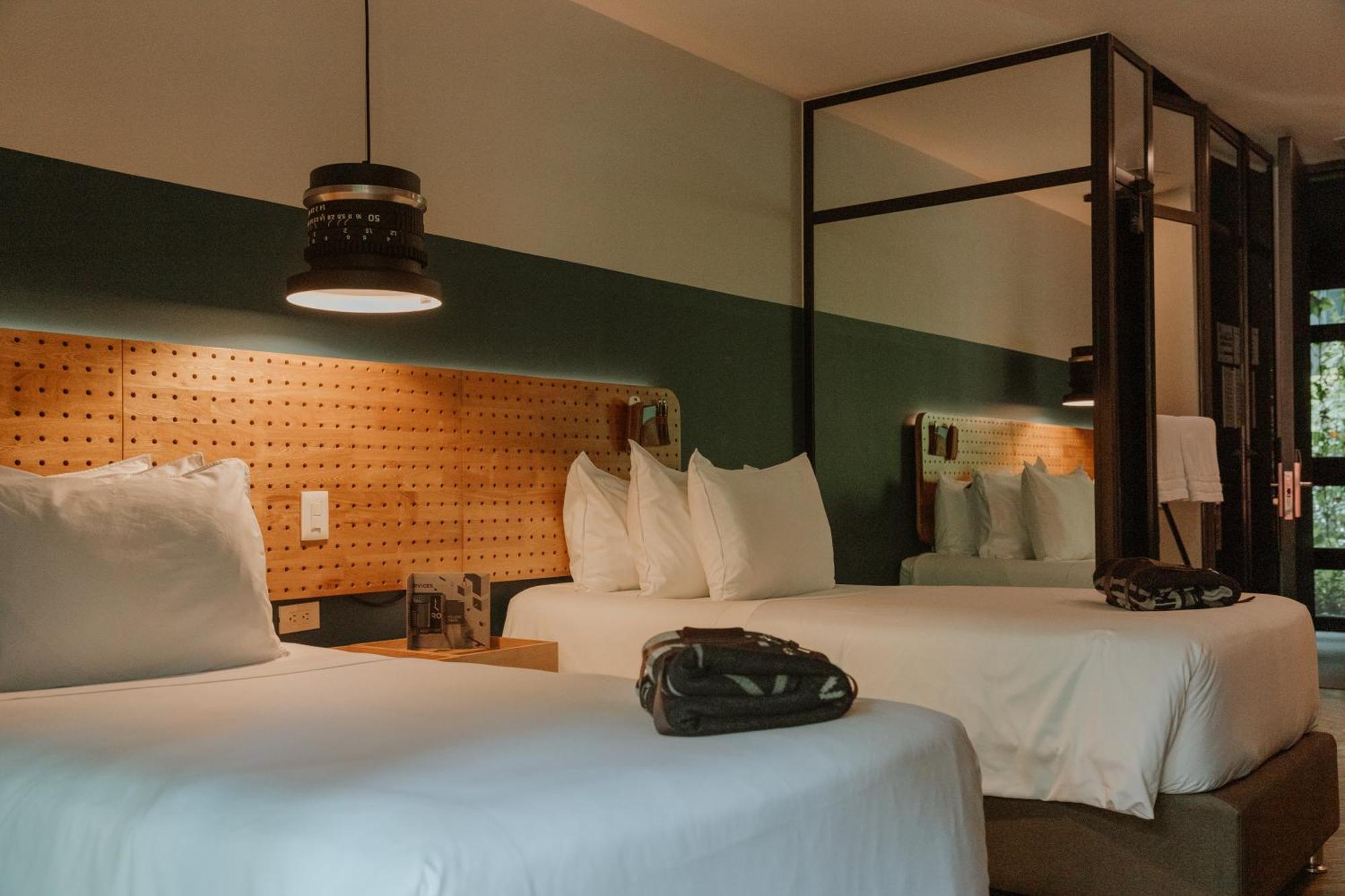The Click Clack Hotel Medellin Bagian luar foto A room at the Hotel 1728