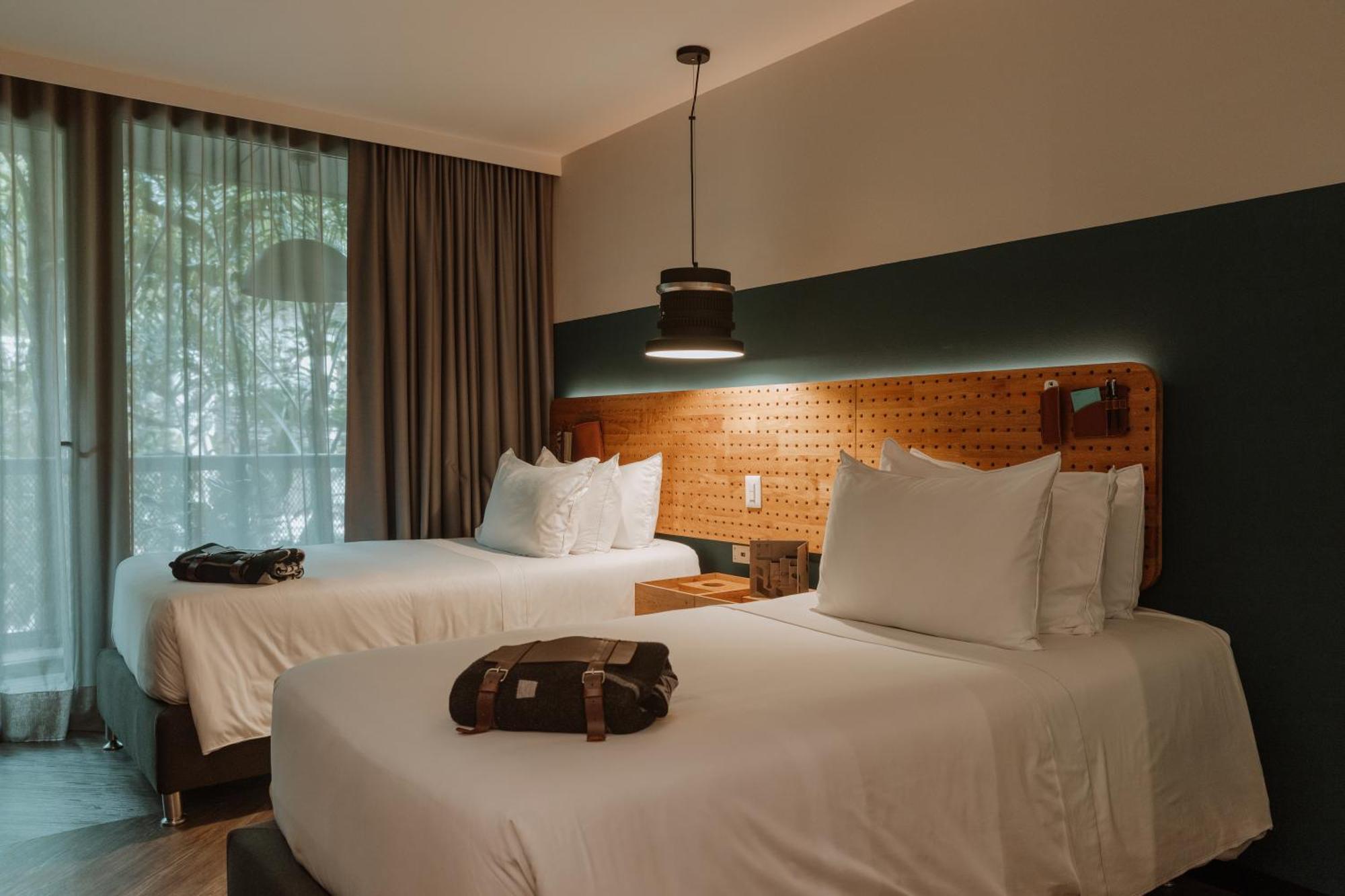 The Click Clack Hotel Medellin Bagian luar foto A room at the hotel