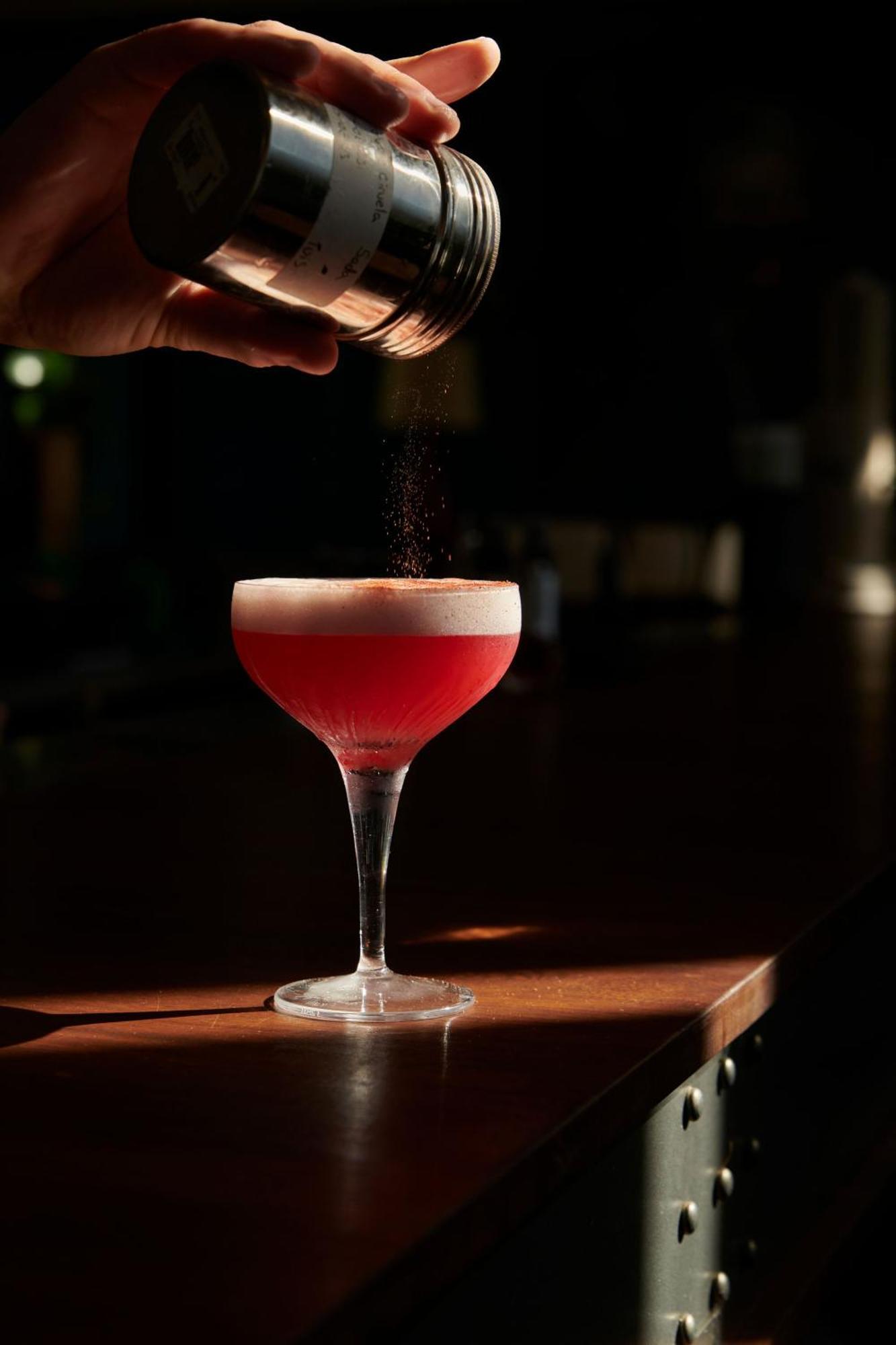 The Click Clack Hotel Medellin Bagian luar foto A Clover Club cocktail being garnished with ground nutmeg