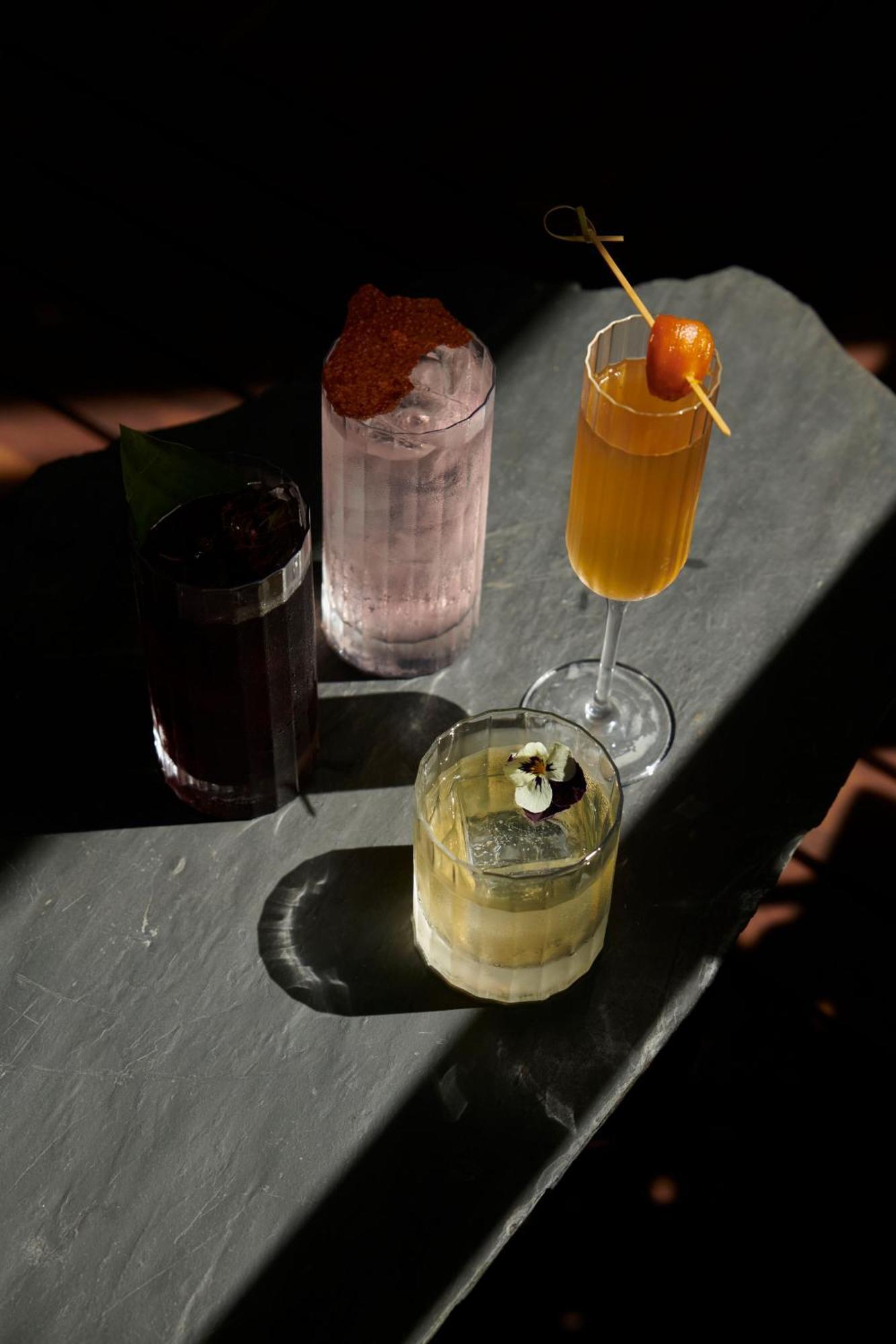 The Click Clack Hotel Medellin Bagian luar foto Cocktails at the bar